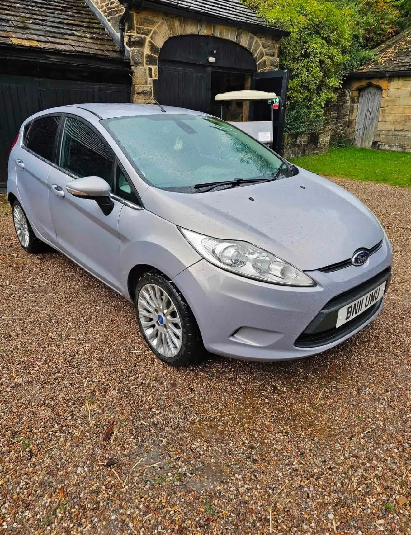 Silver Ford Fiesta Titanium, front three-quarter view showing the registration BN11 UMU