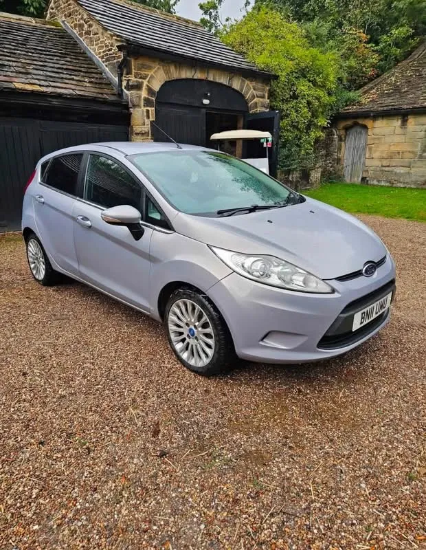 Silver Ford Fiesta Titanium, front three-quarter view from the driver's side